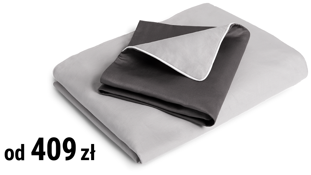 Złożona w kostkę pościel satynowa. Napis: od 409 zł.