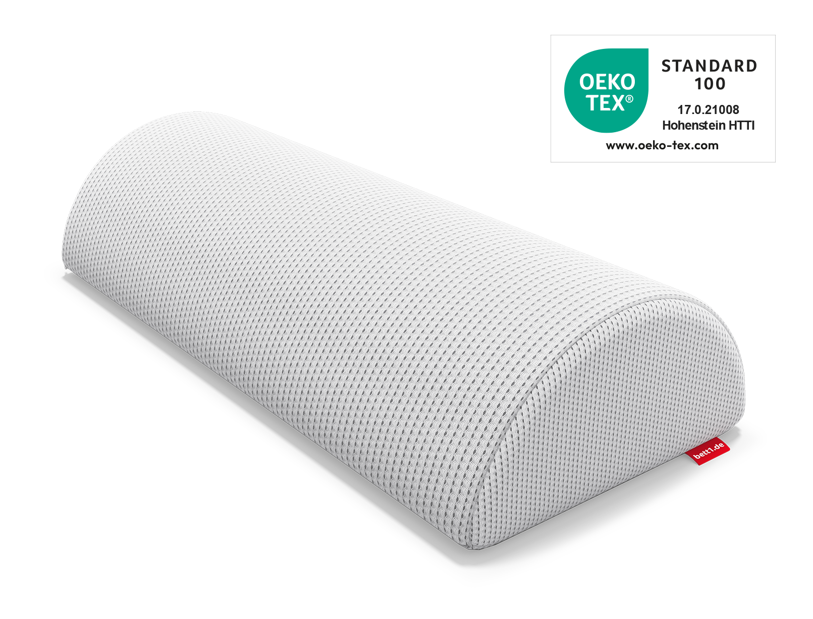 Poduszka półrolka pod nogi albo kark. W prawym gónym rogu logo Oeko-Tex.